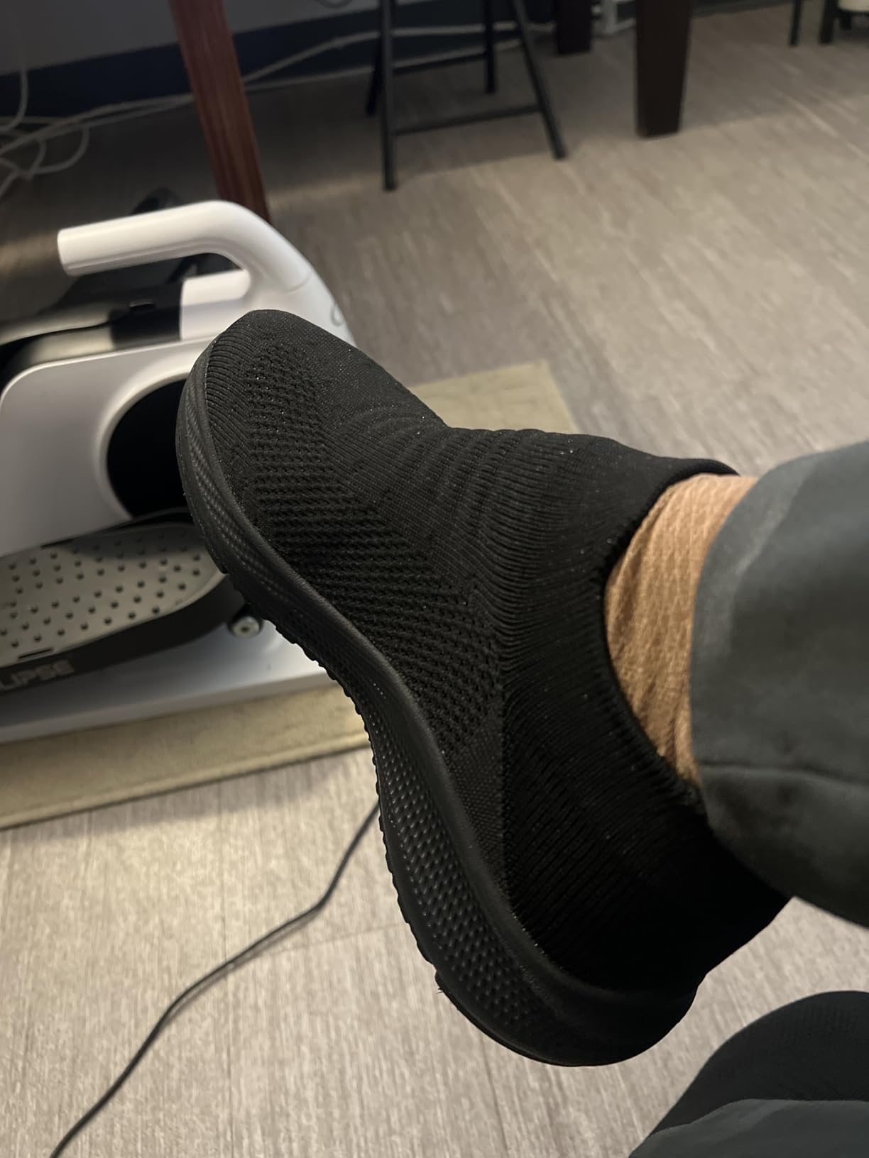 Close-up view of SHULOOK walking shoes showing mesh breathable upper construction and slip-on design