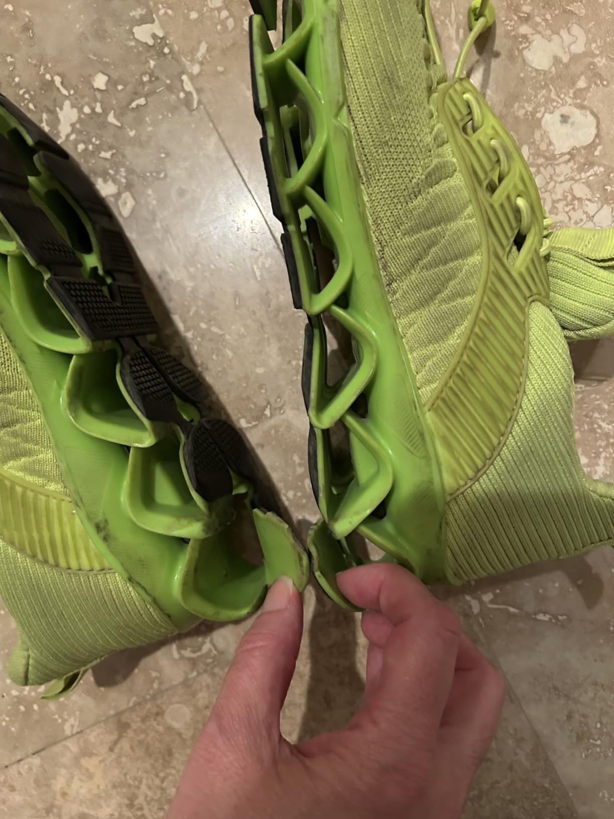 Worn mens blade sneakers showing separation and durability issues after short-term use