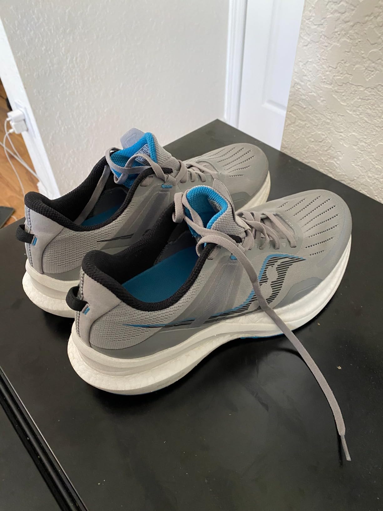 Saucony Tempus side profile showing midsole technology and overall design aesthetic