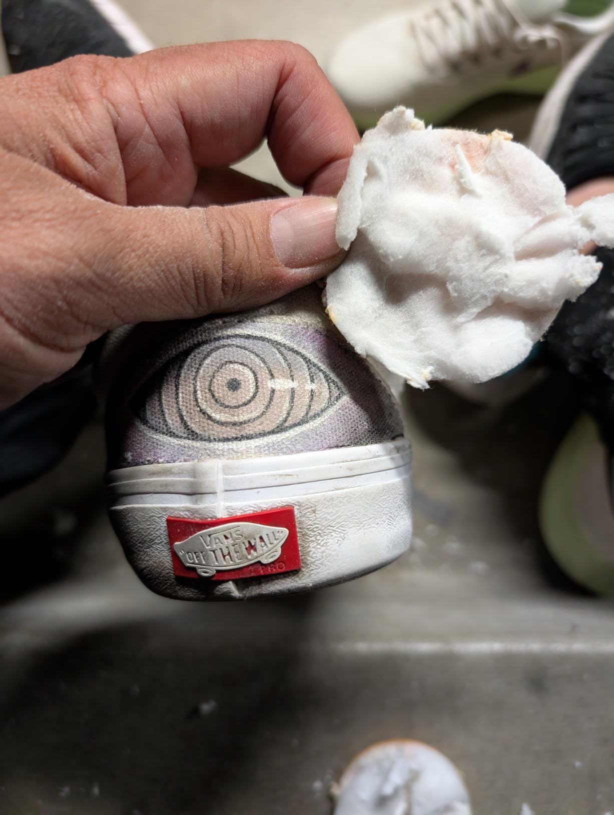 SneakERASERS being used on different shoe materials showing varying effectiveness