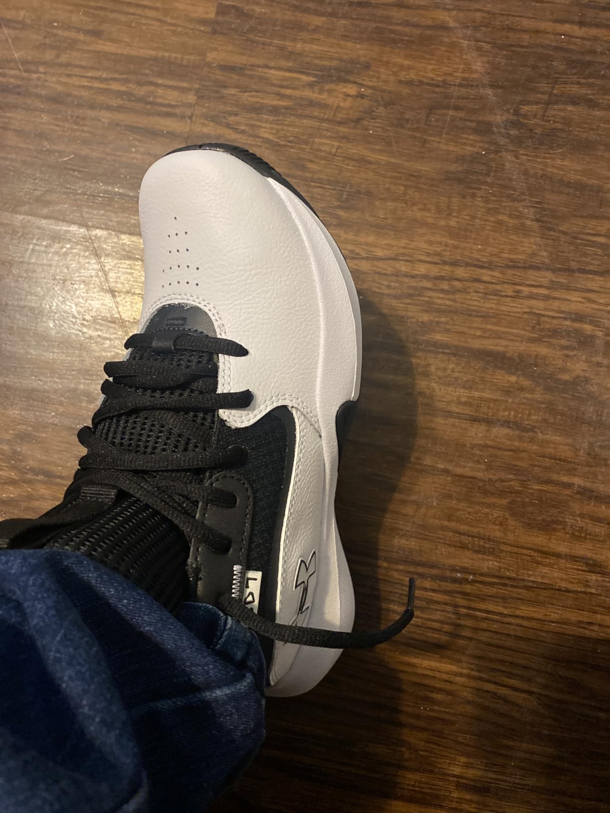 Under Armour Lockdown 7 sole showing herringbone traction pattern and EVA midsole construction