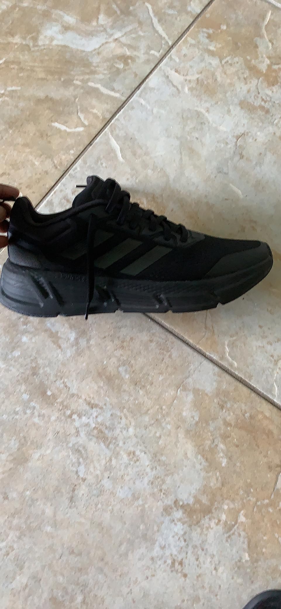 Adidas Questar compared to other athletic shoes showing size and profile differences