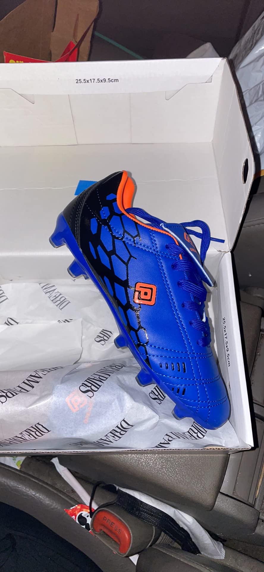 DREAM PAIRS soccer cleats showing suede upper construction and lacing system detail