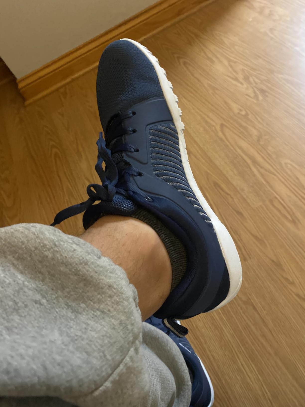 WHITIN barefoot trail shoes showing reflective stripe and tread pattern detail