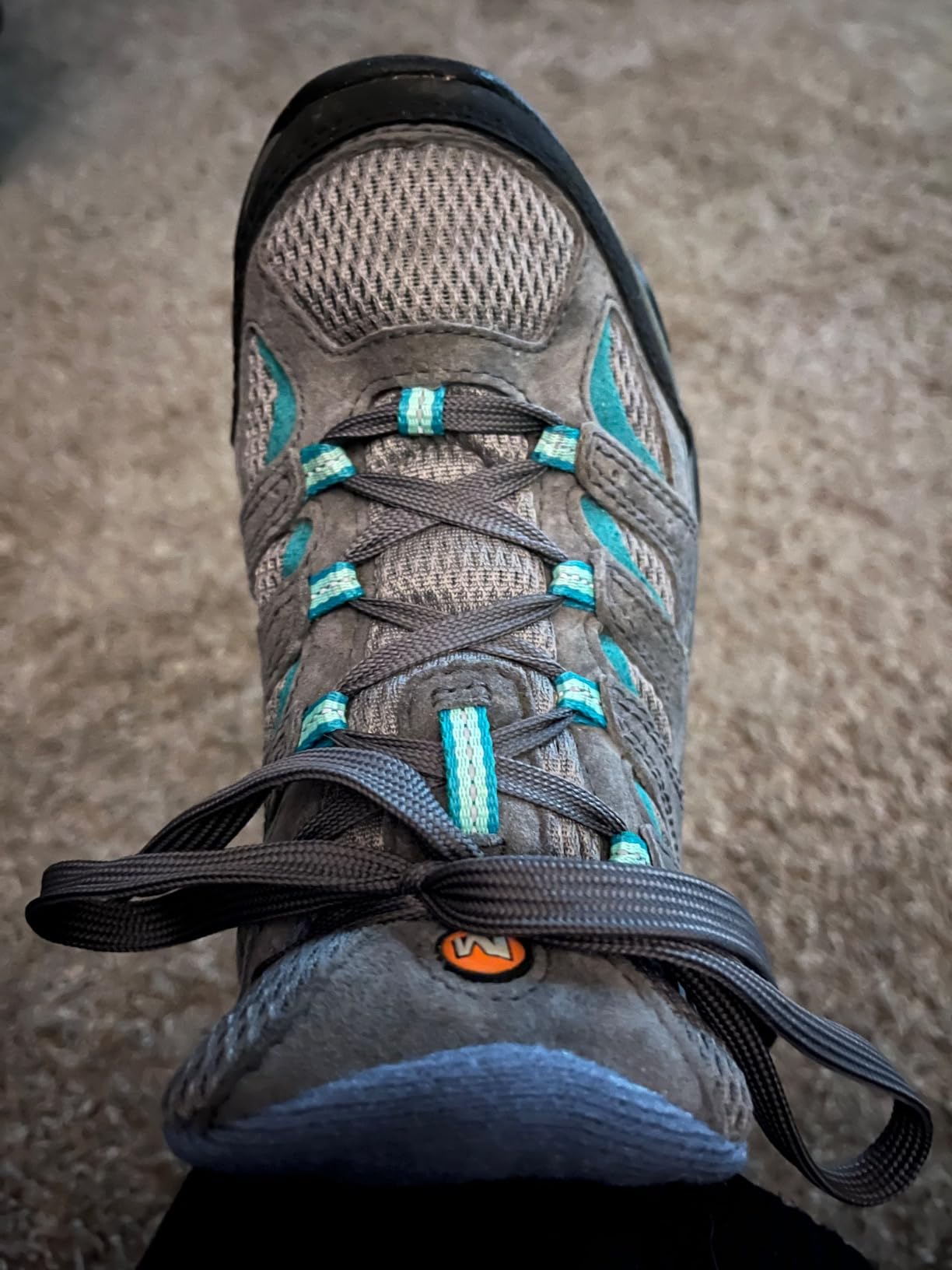 Merrell Moab 3 detail showing protective toe cap and breathable mesh construction