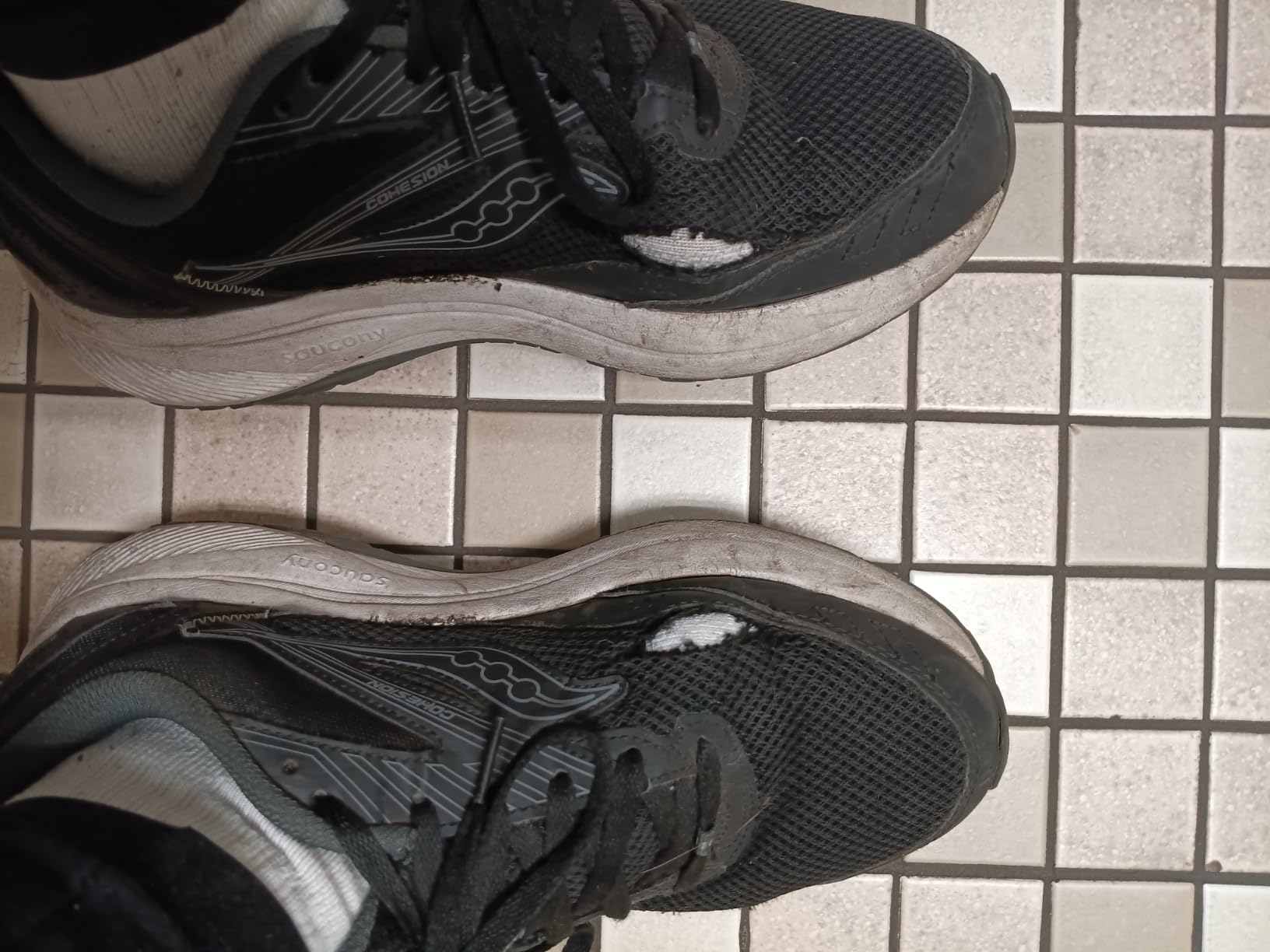 Saucony Cohesion 15 showing wear patterns after months of use, demonstrating durability concerns