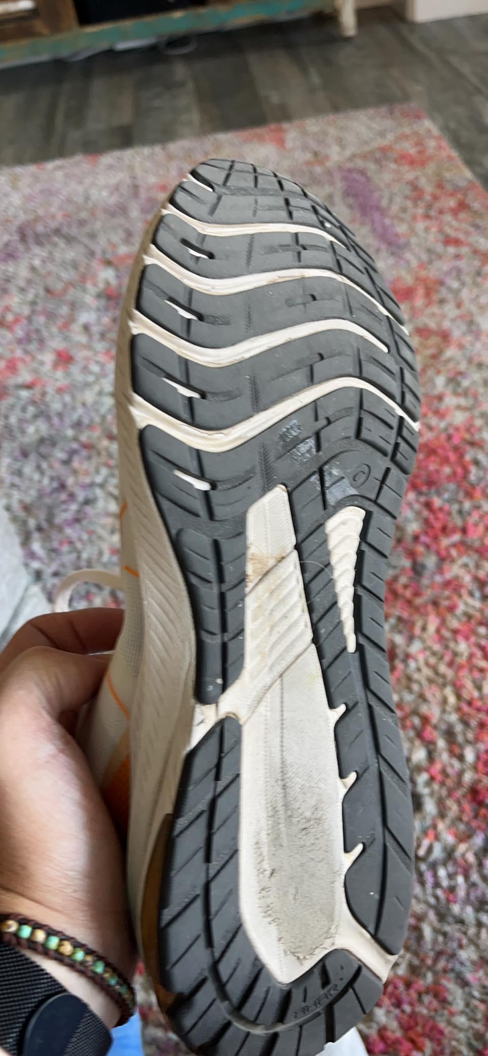 ASICS GT-1000 12 showing outsole wear pattern after several months of use