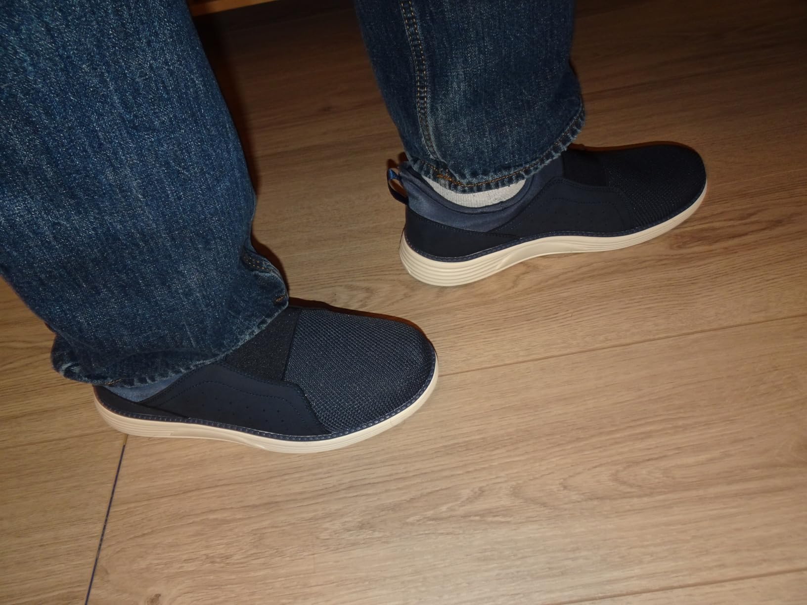 YOLARK shoe construction showing mesh upper and leather heel detail