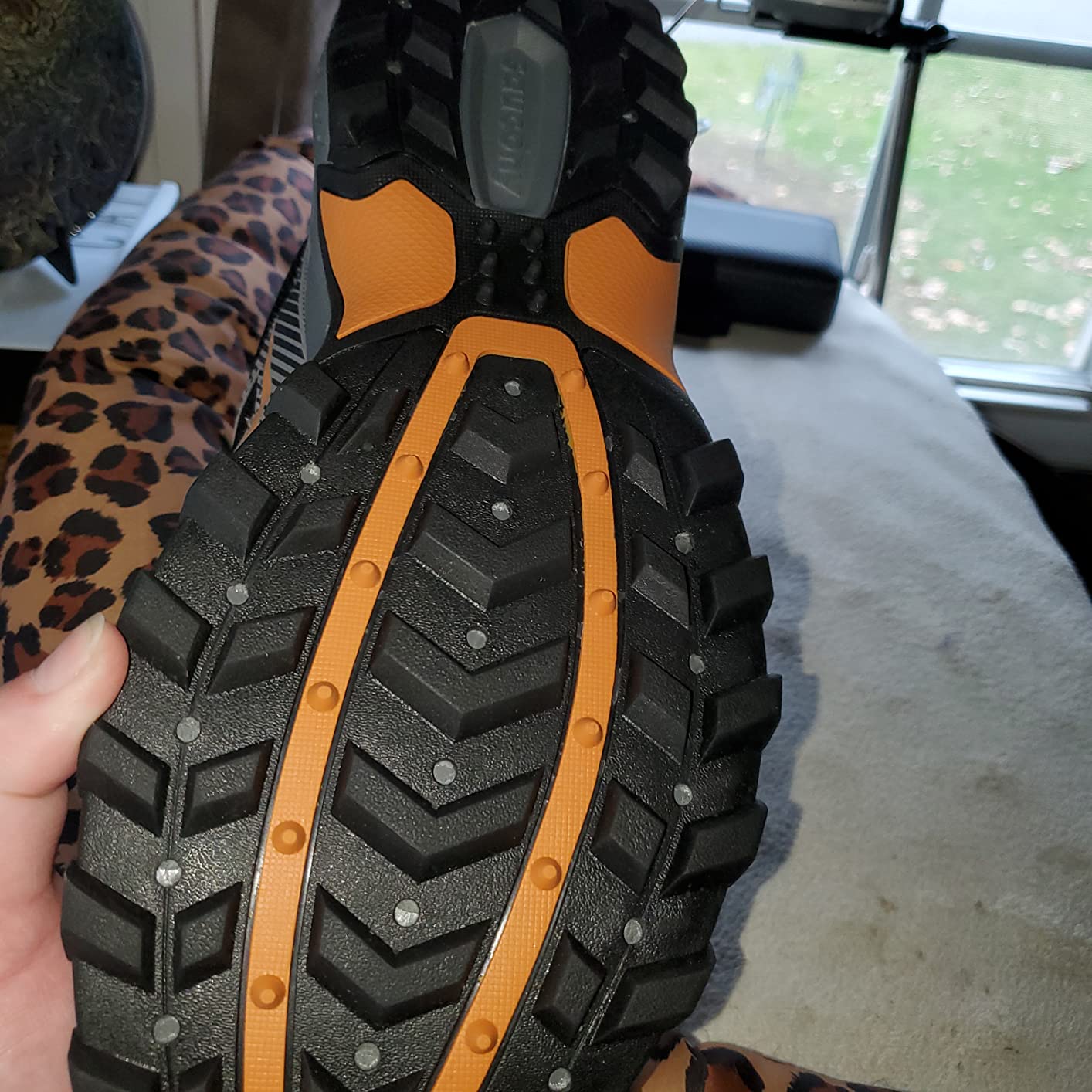 Saucony TR16 in natural outdoor setting showing intended use case for day hiking and trail running