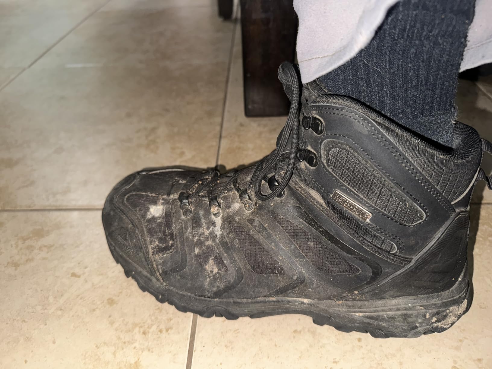 Close-up detail of NORTIV 8 hiking boot construction showing stitching and materials