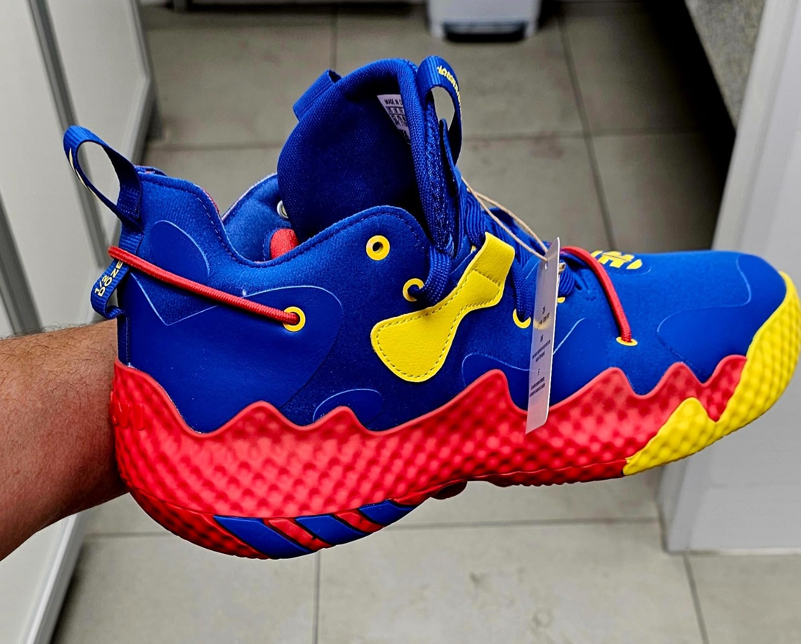 Adidas Harden Vol 6 basketball shoe side profile showing Boost midsole and ankle support design
