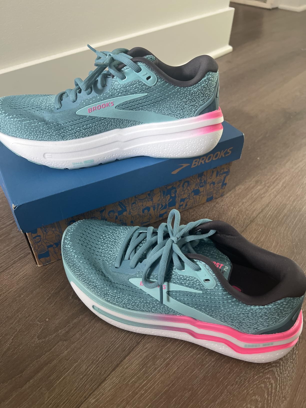 Brooks Ghost Max 2 women's running shoe showing pink accent colorway and maximum cushioning design