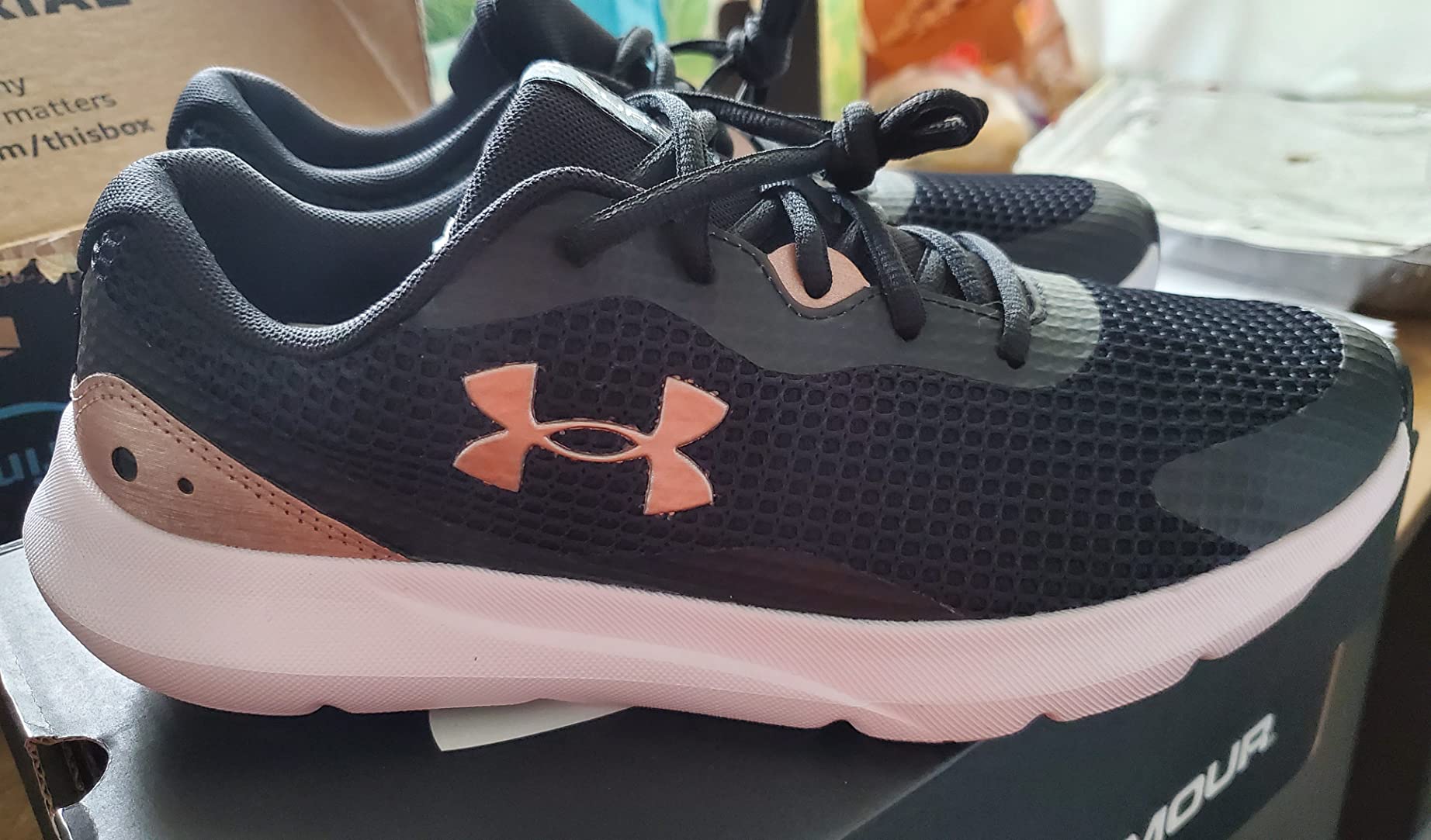 Under Armour Surge 3 side profile showing EVA midsole and rubber outsole design