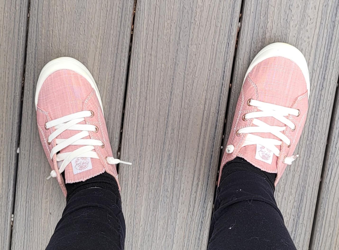 Side view of Roxy Rory sneaker demonstrating the slip-on collar stretch and overall silhouette