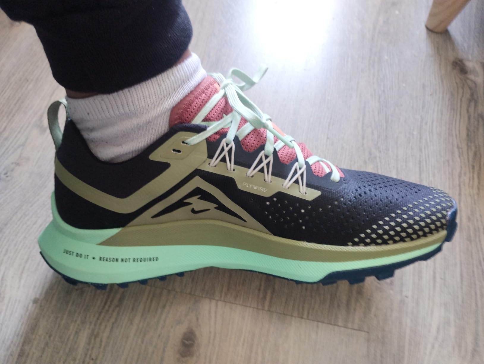 Nike Men's Trail Running Sneaker in Lt Iron Ore Volt Cobblestone colorway showing mesh upper and rubber trail sole