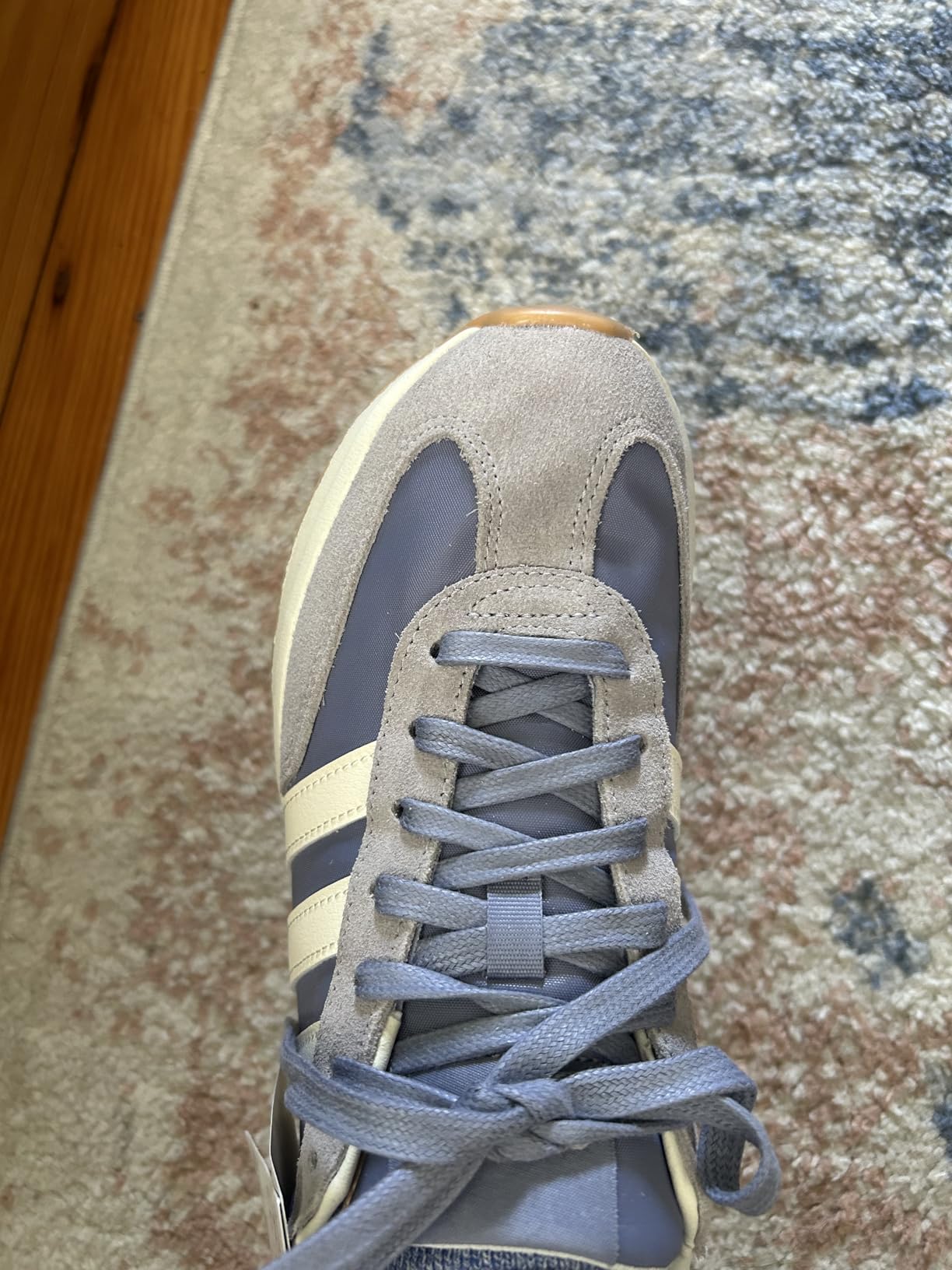 Adidas Run 72 showing toe area construction and lacing system detail
