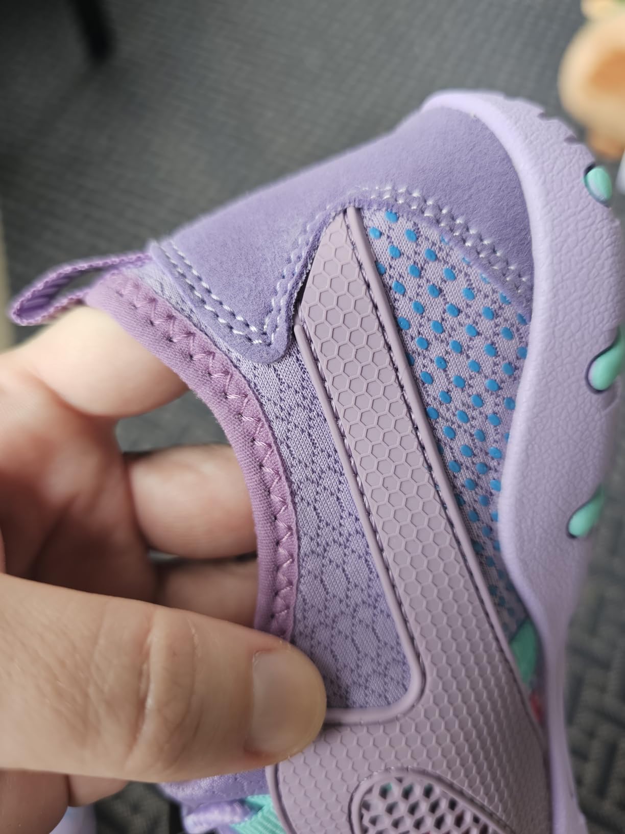 Product features closeup showing drainage holes and toe protection design of MAYZERO water shoes