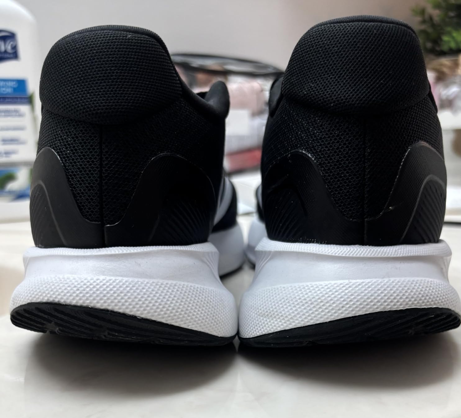 Side profile view of Adidas Run Falcon 5 showing cloudfoam midsole and heel design