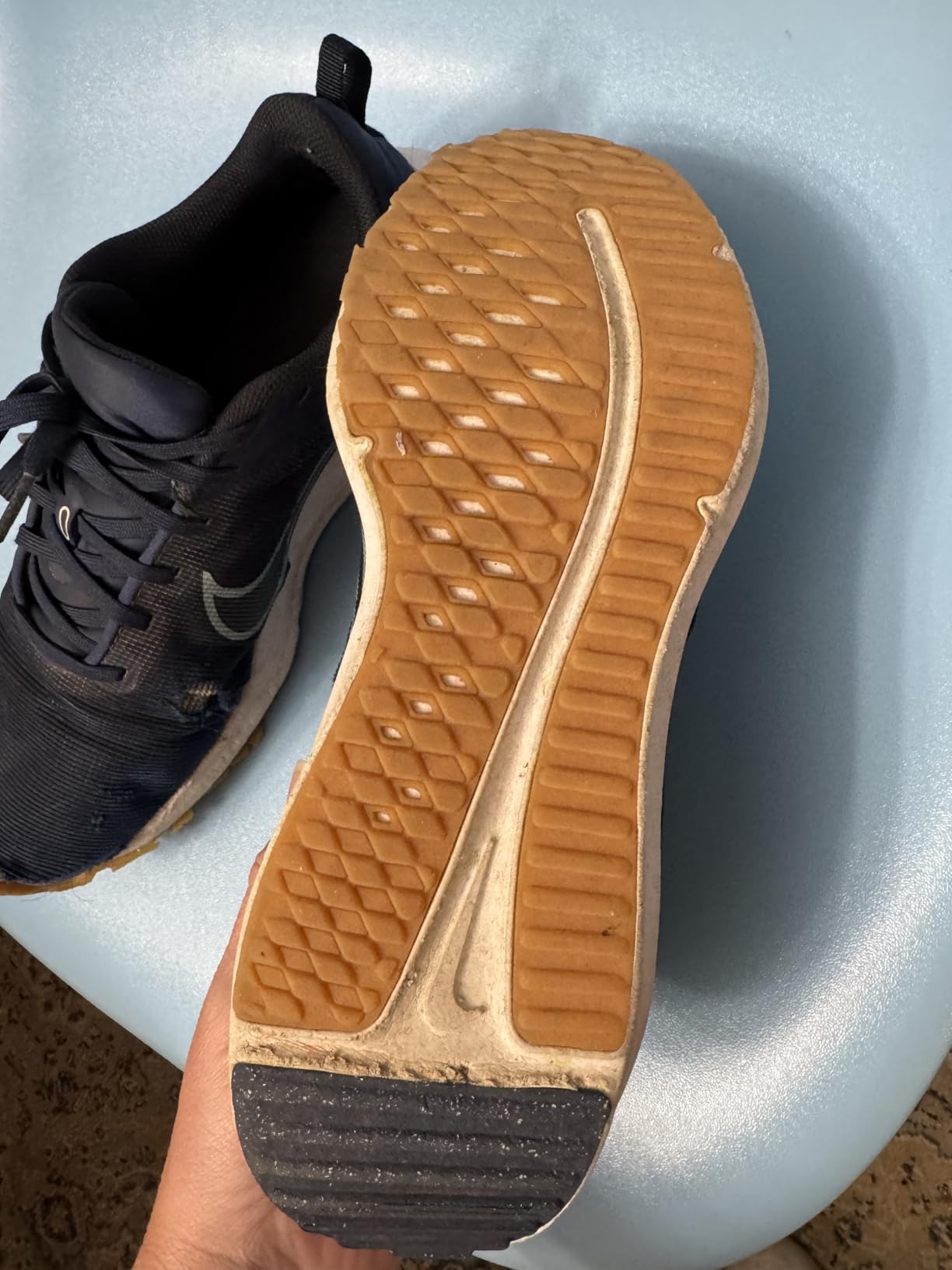 Nike Downshifter 12 final assessment showing overall condition after extensive testing period