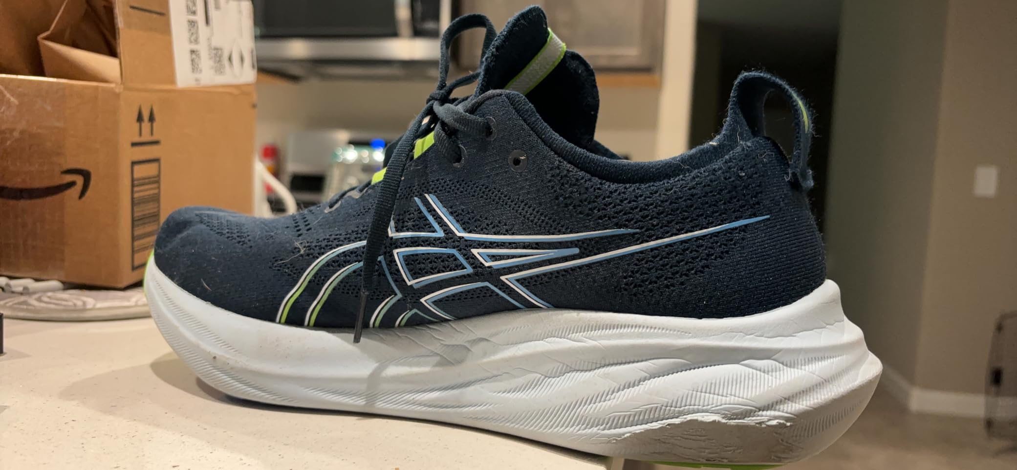 ASICS Gel-Nimbus 26 showing foam midsole construction with FF BLAST PLUS ECO technology