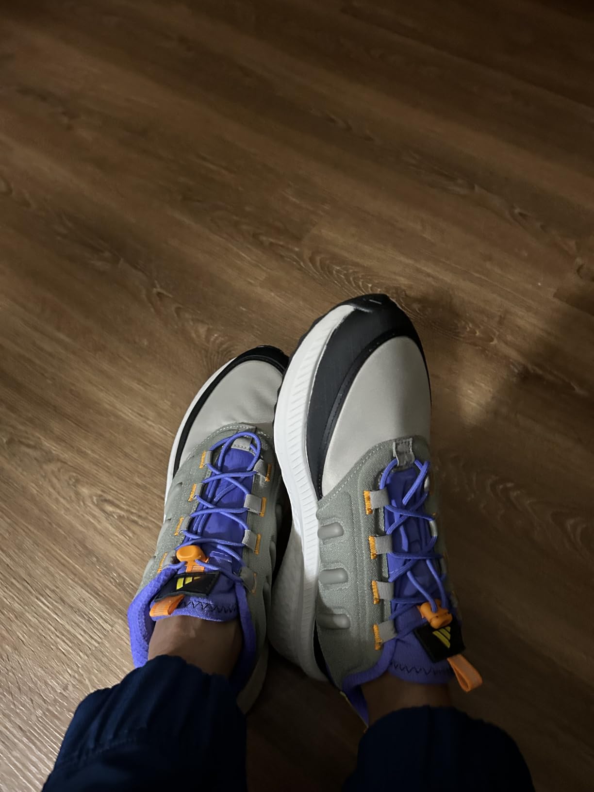 Side profile view showing TPU 3-Stripes design and overall silhouette of X_PLR Path