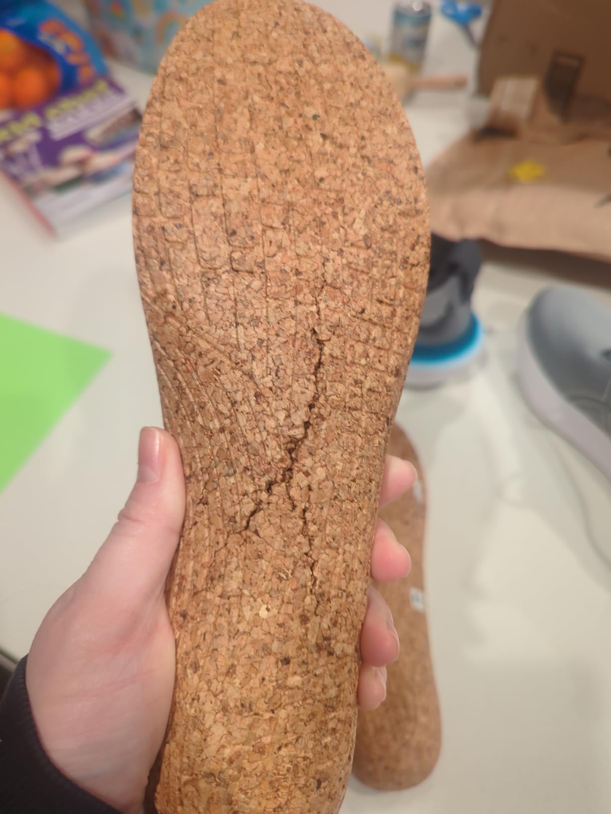 SOLE insoles fitted in different types of shoes showing versatility across footwear