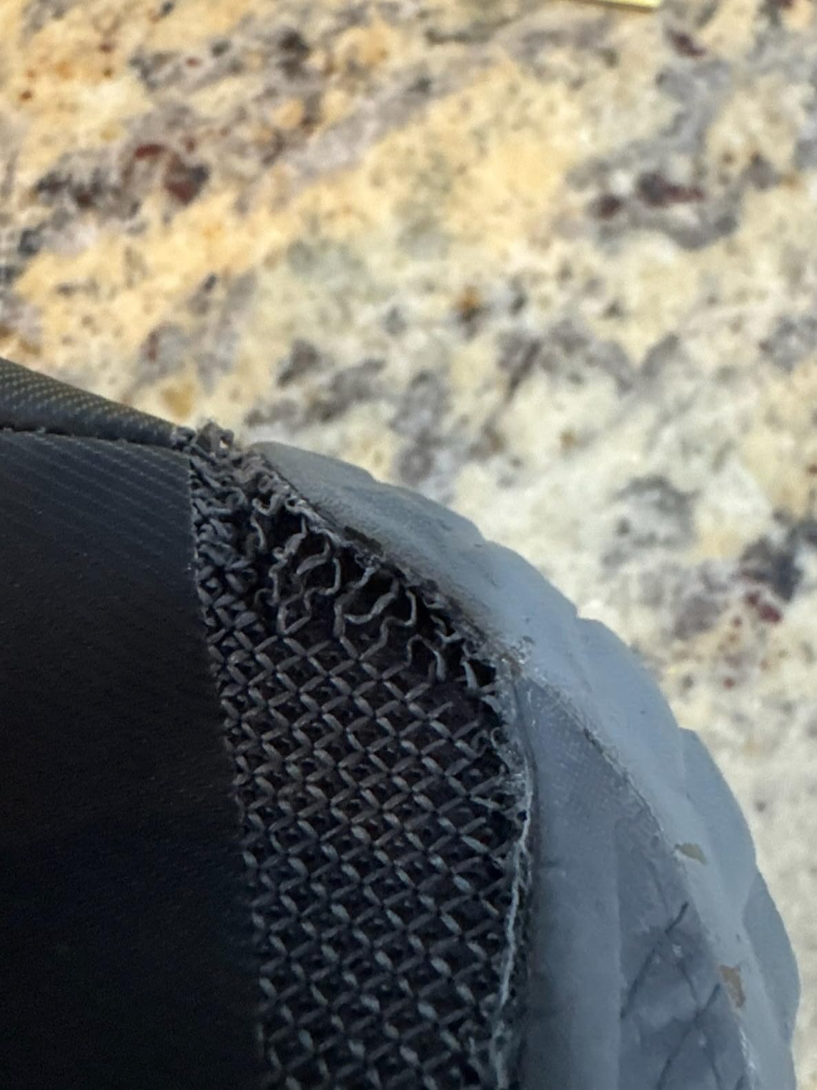 Merrell Trail Glove 6 showing detailed upper construction and recycled mesh materials