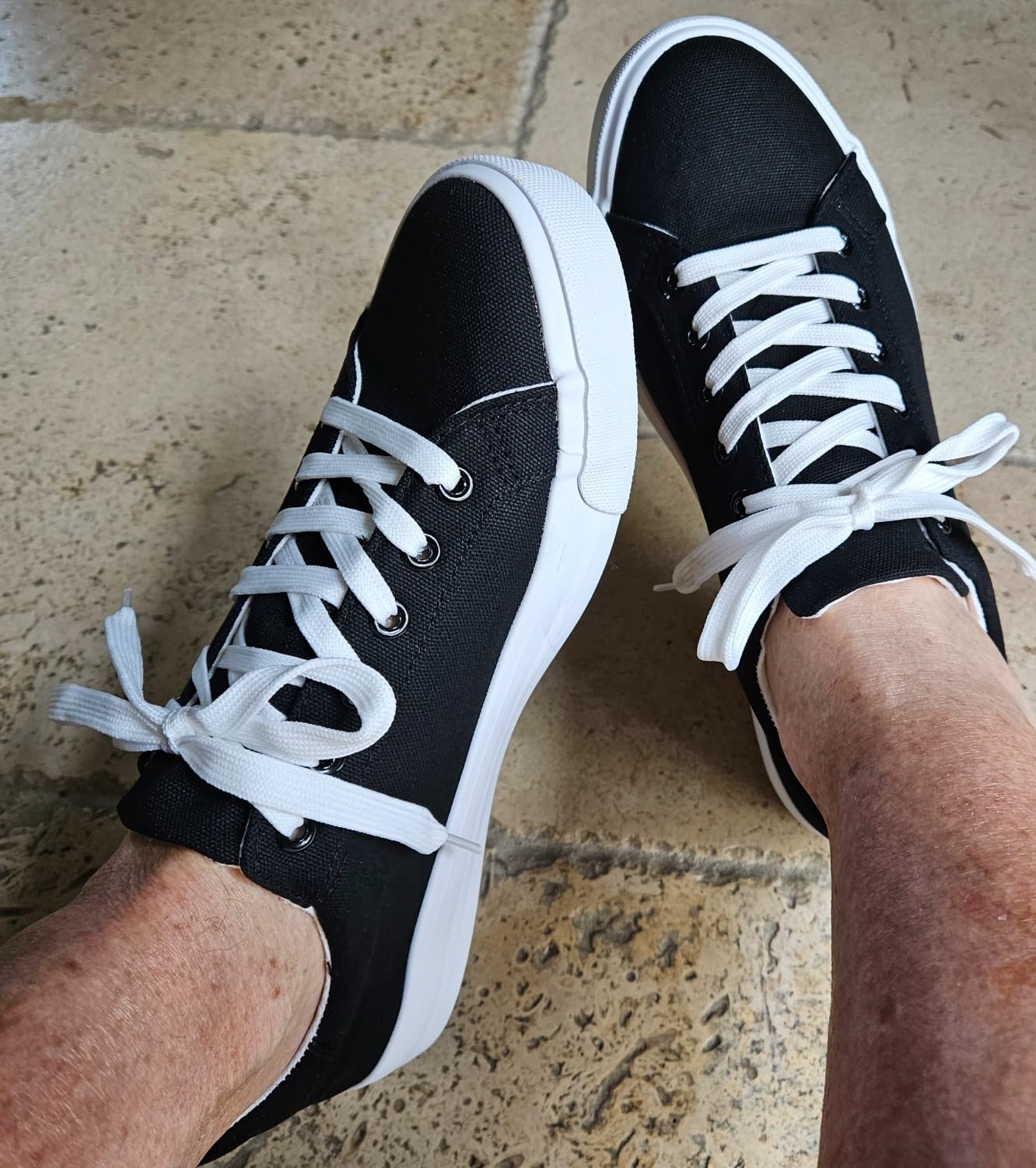 Bottom view of Witwatia sneakers showing textured rubber outsole and grip pattern