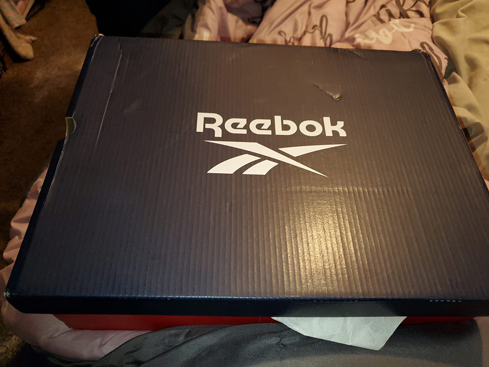 Reebok Resonator Mid basketball shoes worn by female athlete showing real-world usage