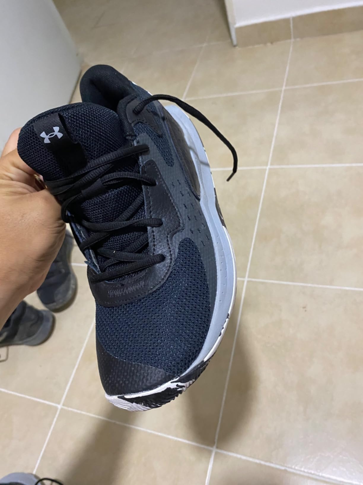 Under Armour Jet 23 side profile highlighting Micro G midsole and anatomical outsole design