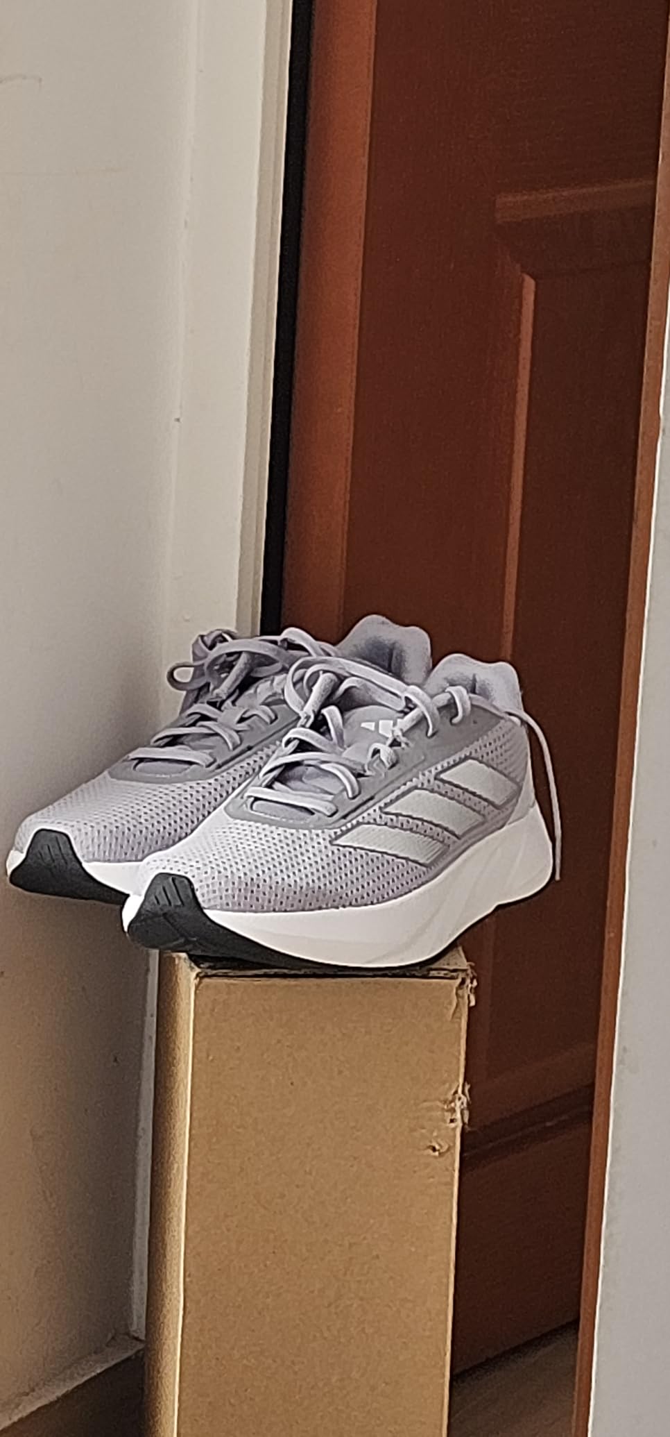 Adidas Duramo SL outsole showing Adiwear rubber compound and traction pattern