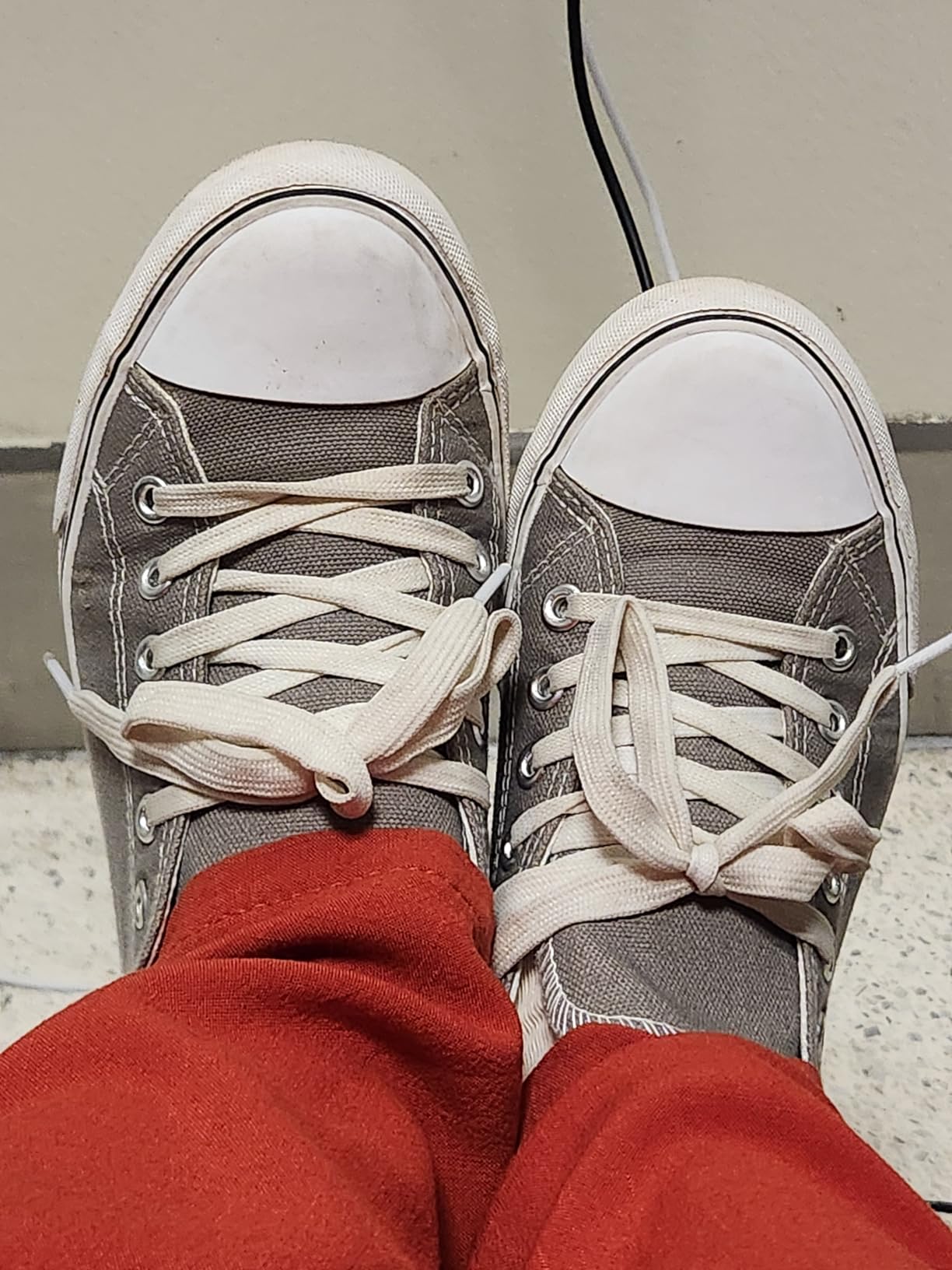 Adokoo women's canvas sneakers in gray colorway showing classic low-top design and lace-up style