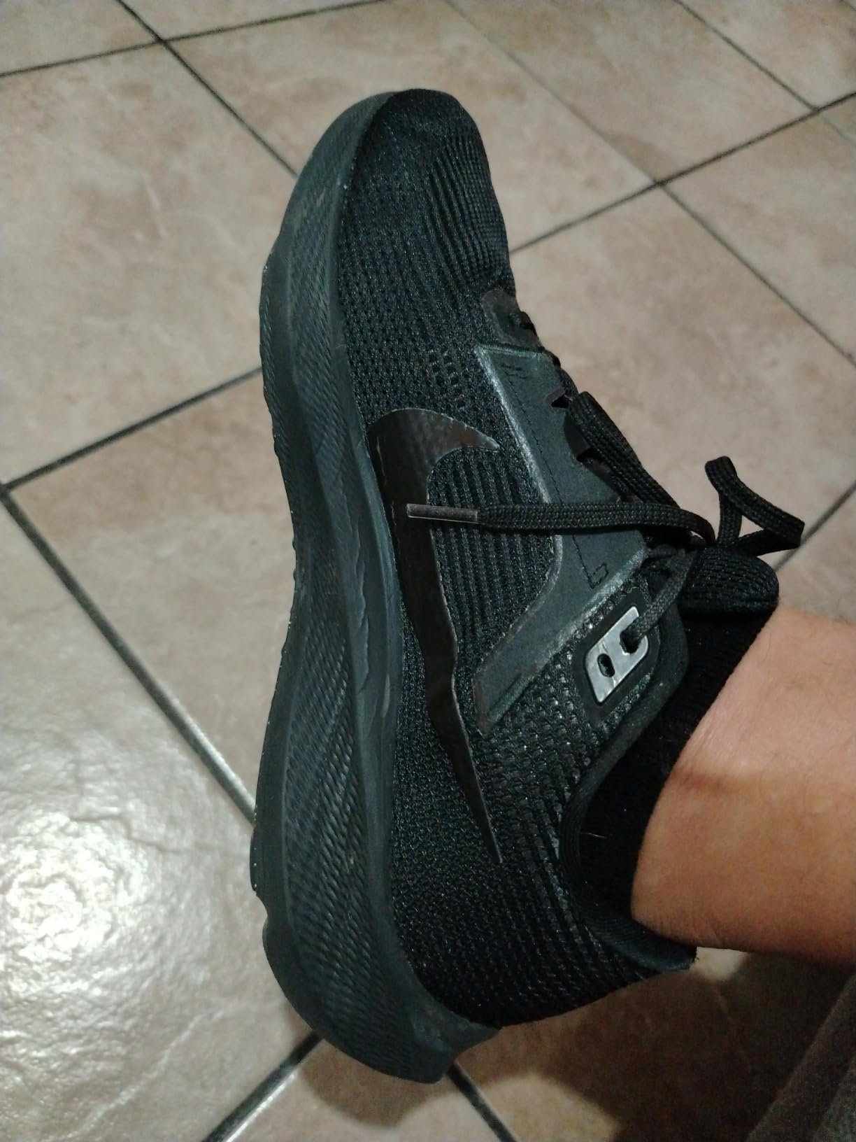 Nike React foam midsole and Air Zoom unit technology visible in forefoot section
