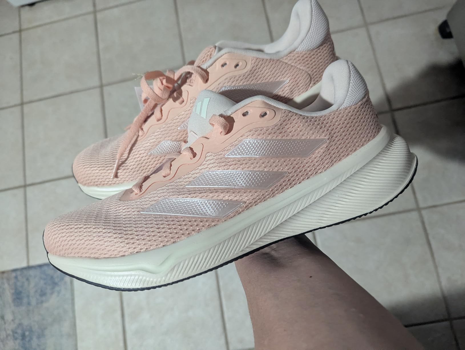 Adidas Women's Response shoes on various surfaces showing versatility and traction