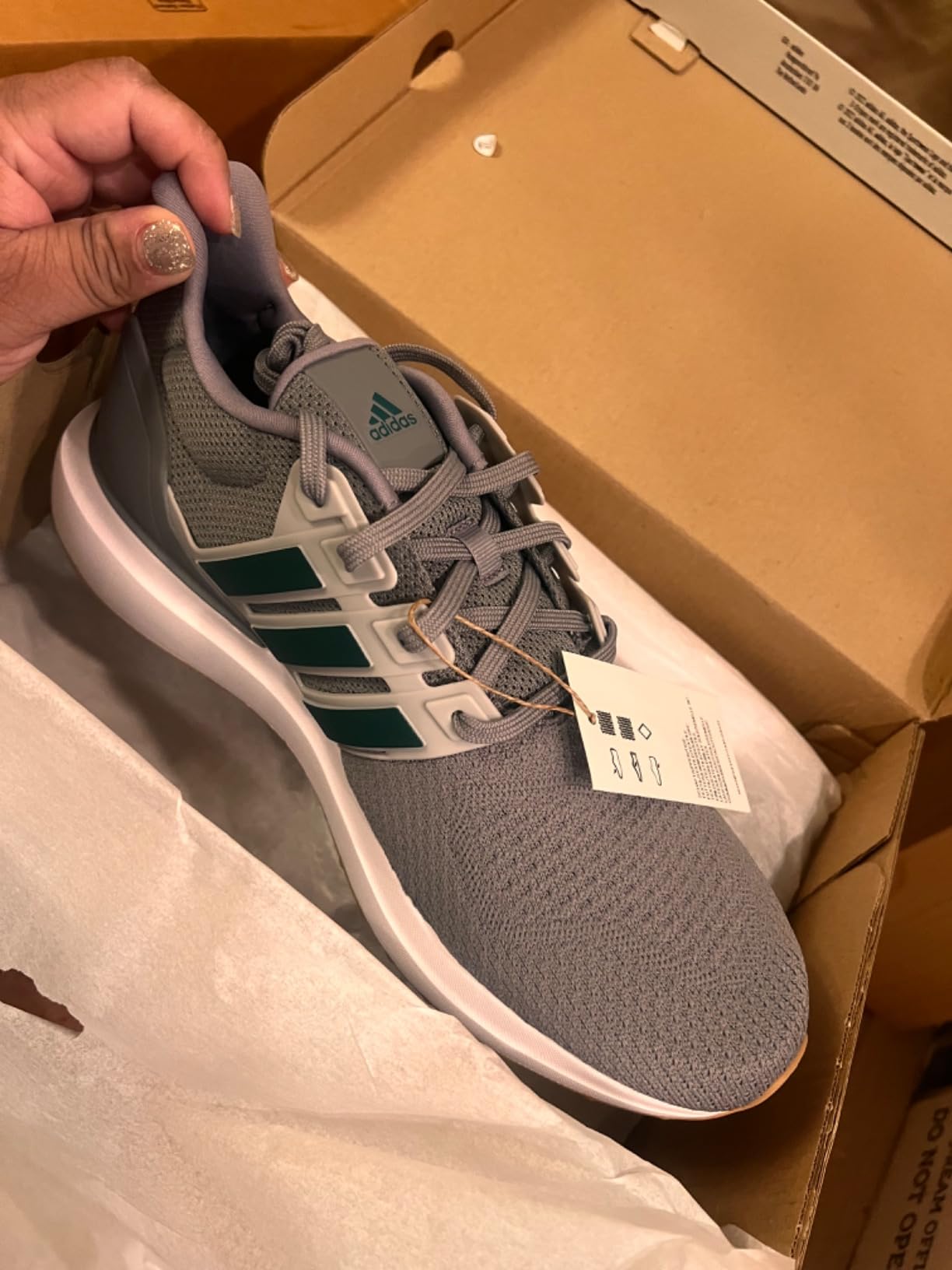 Adidas Ubounce DNA lifestyle shot showing versatile styling and color options