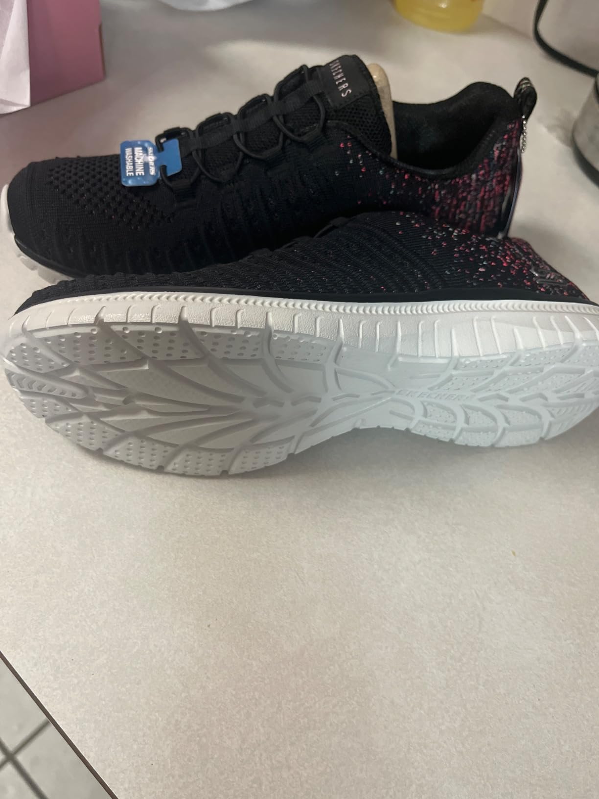 Interior view showing Skechers Memory Foam insole and fabric lining details