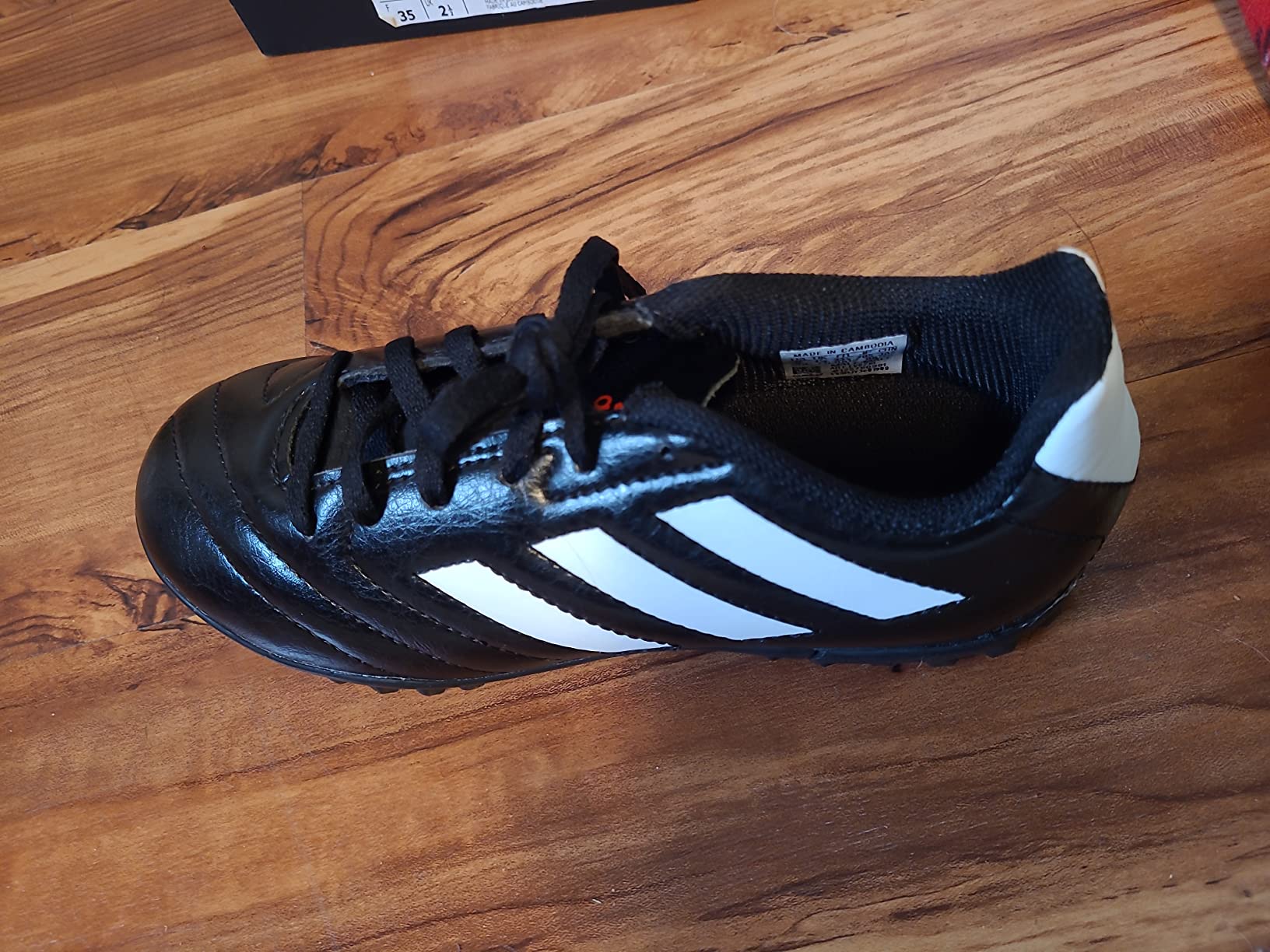Adidas Kids Goletto soccer shoes showing overall design and construction quality