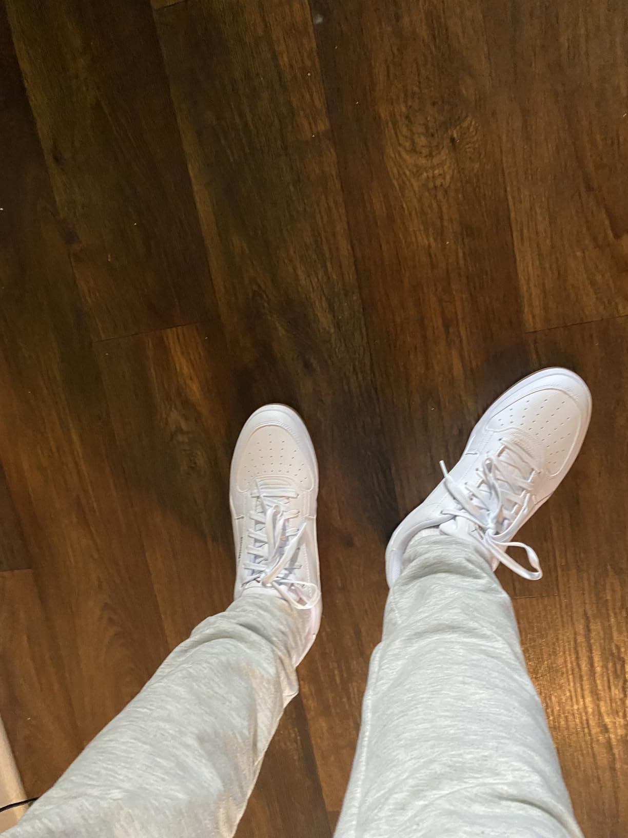 PUMA Men's Caven 2.0 sneaker white colorway showing retro basketball design and stacked midsole
