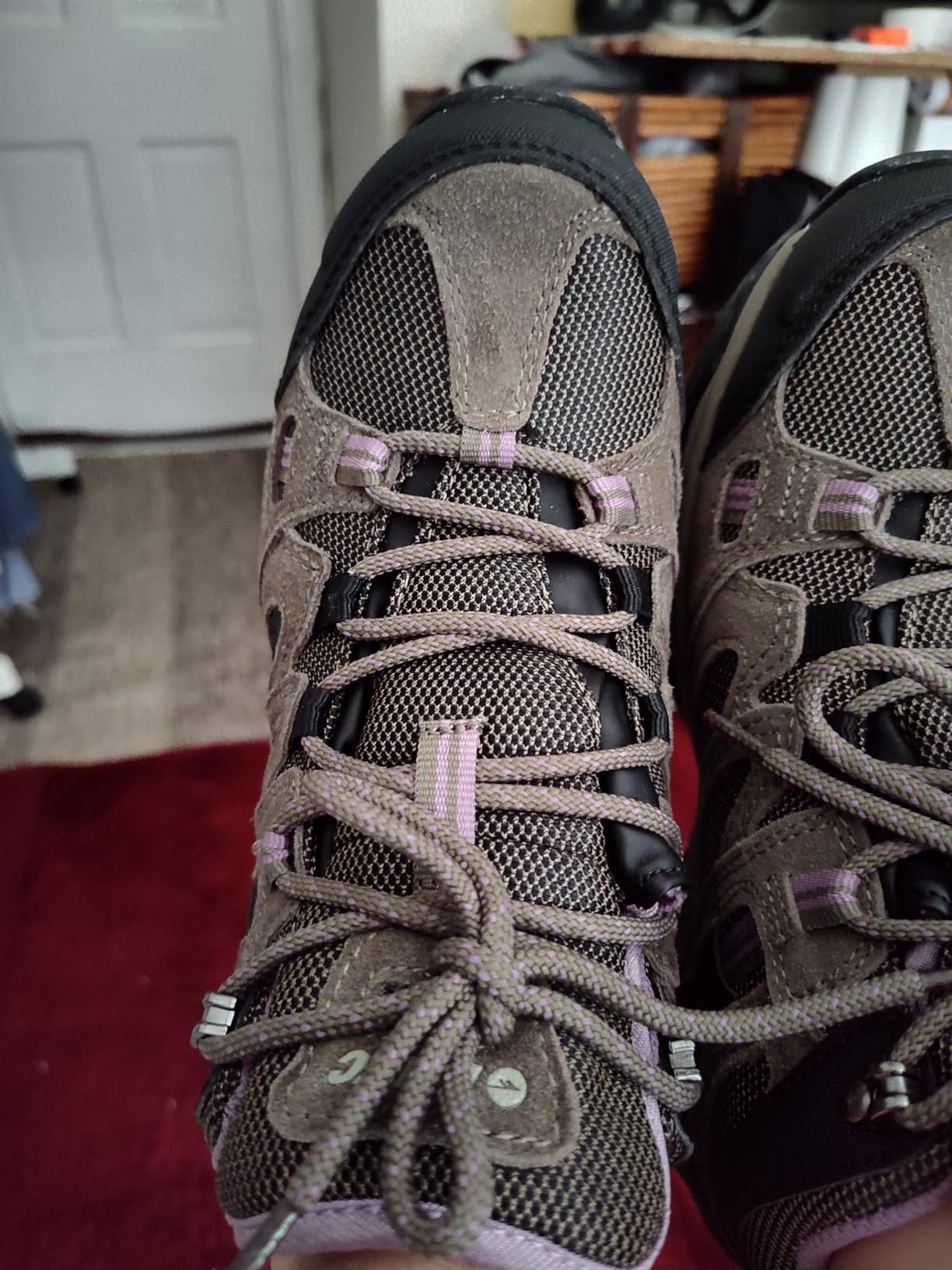 Side profile comparison showing HI-TEC boot design elements and construction quality details