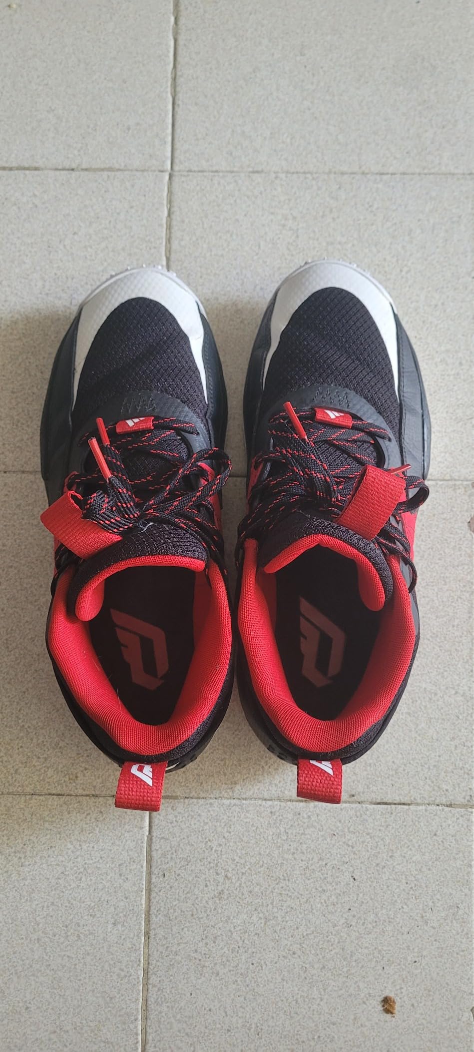 Dame Certified basketball shoe upper construction showing synthetic textile materials and lacing system