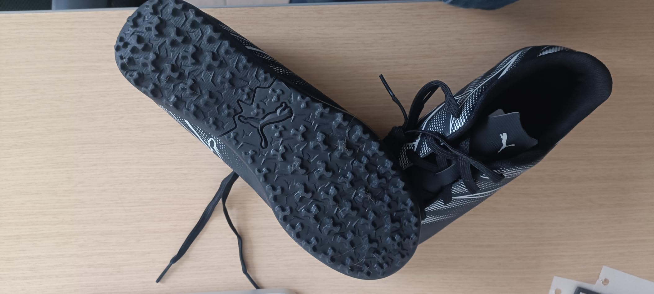 PUMA Attacanto soccer cleat showing heel construction and overall build quality