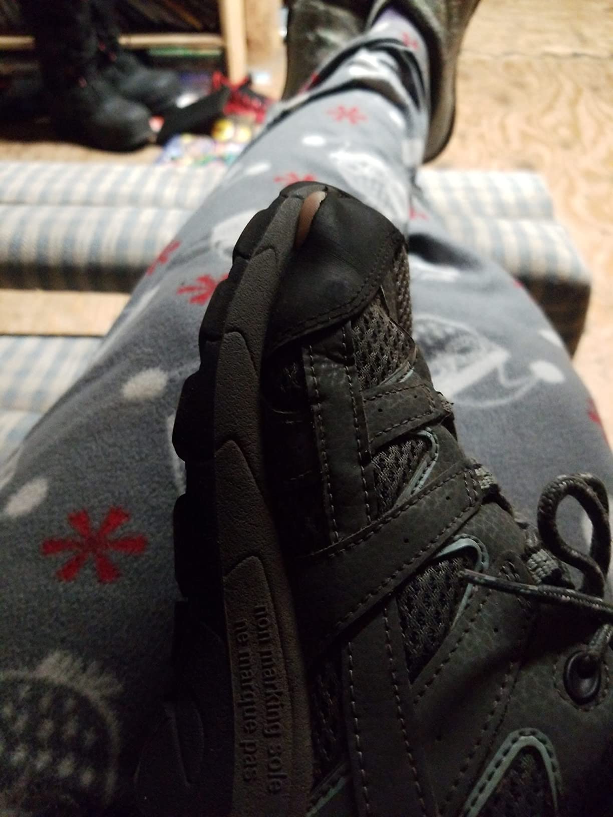 Split sole on Merrell Kids Moab 2 hiking shoes showing construction failure