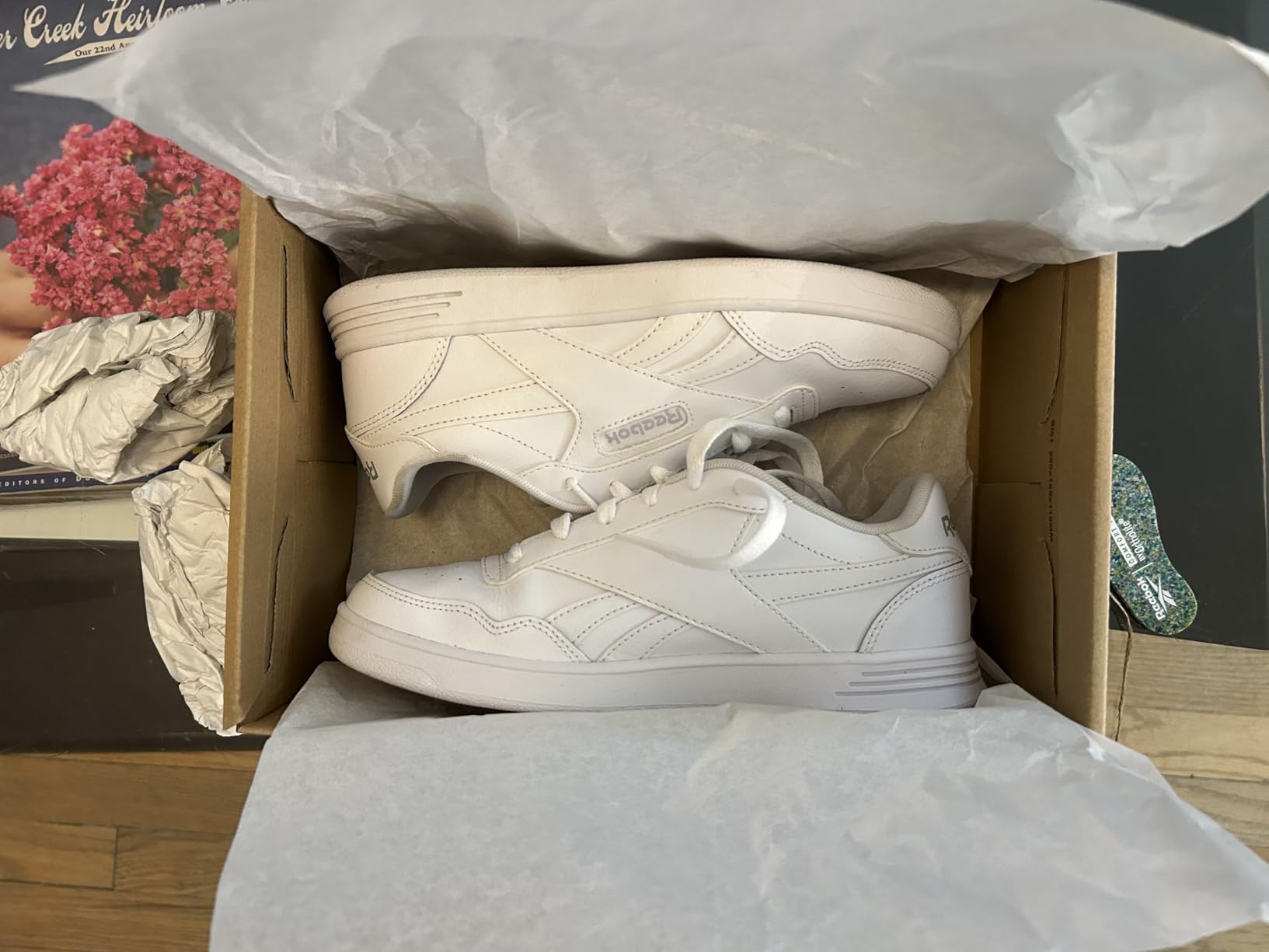 Reebok Court Advance detail shot showing leather upper construction and perforated side panels