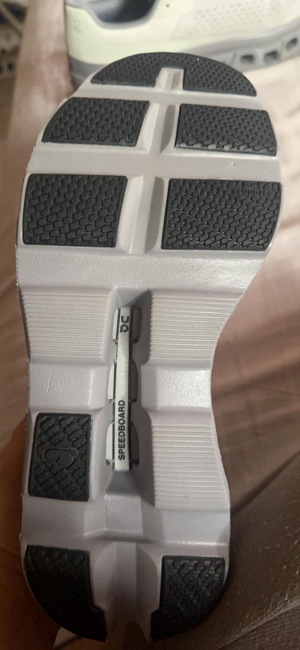 On Cloudmonster durability testing showing wear patterns after extended use