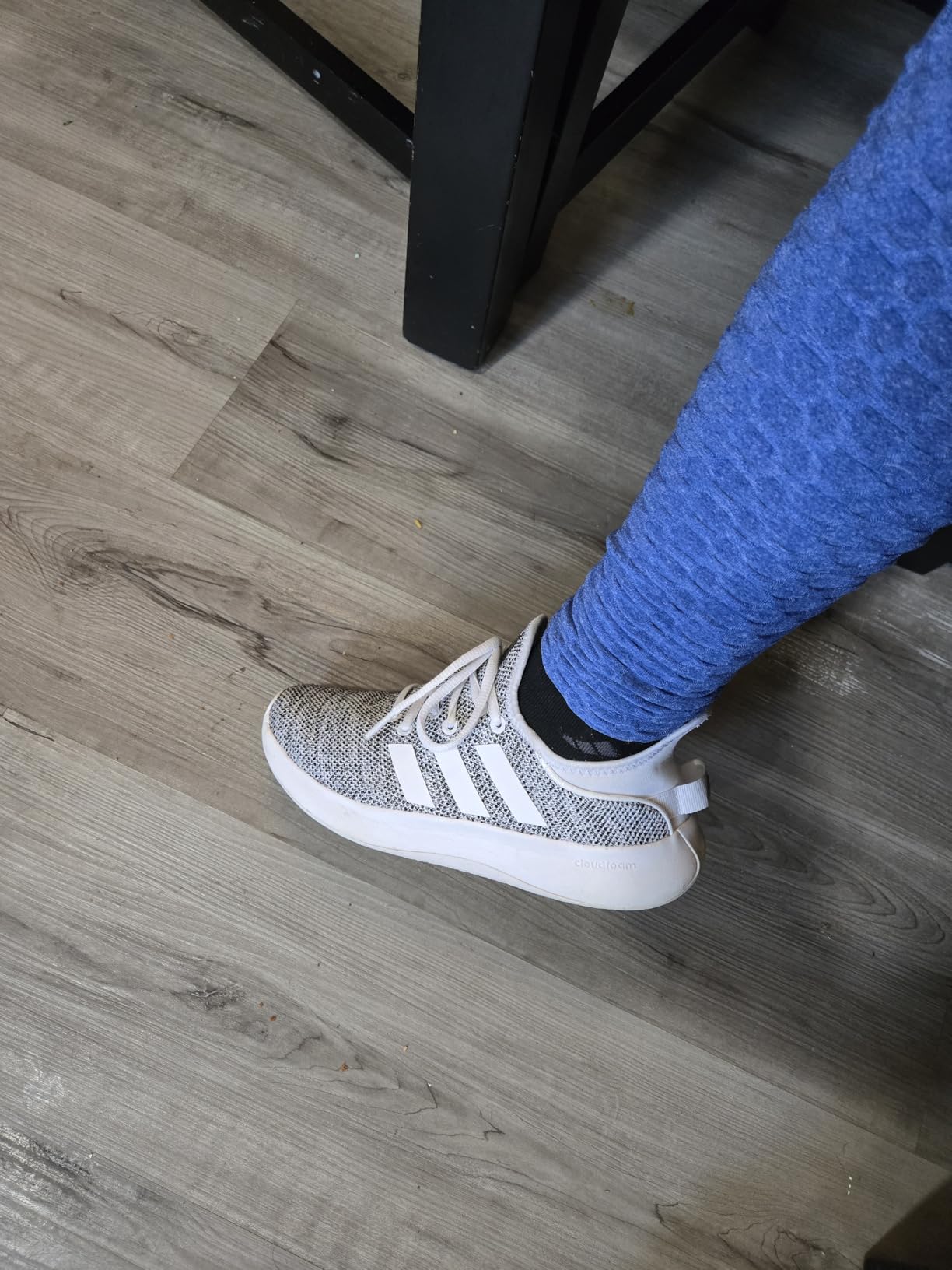 Adidas Women's Cloudfoam Pure sneakers white colorway showing lightweight design and slip-on style