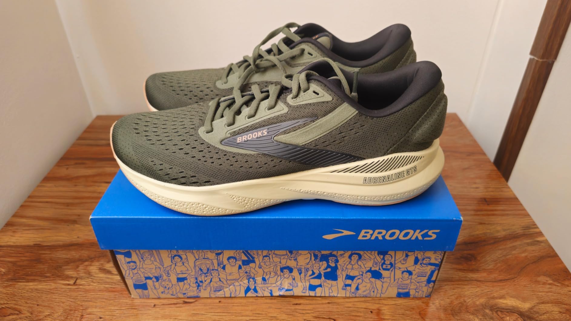 Brooks Men's Adrenaline GTS 24 running shoe in blue and orange colorway showing GuideRails support technology