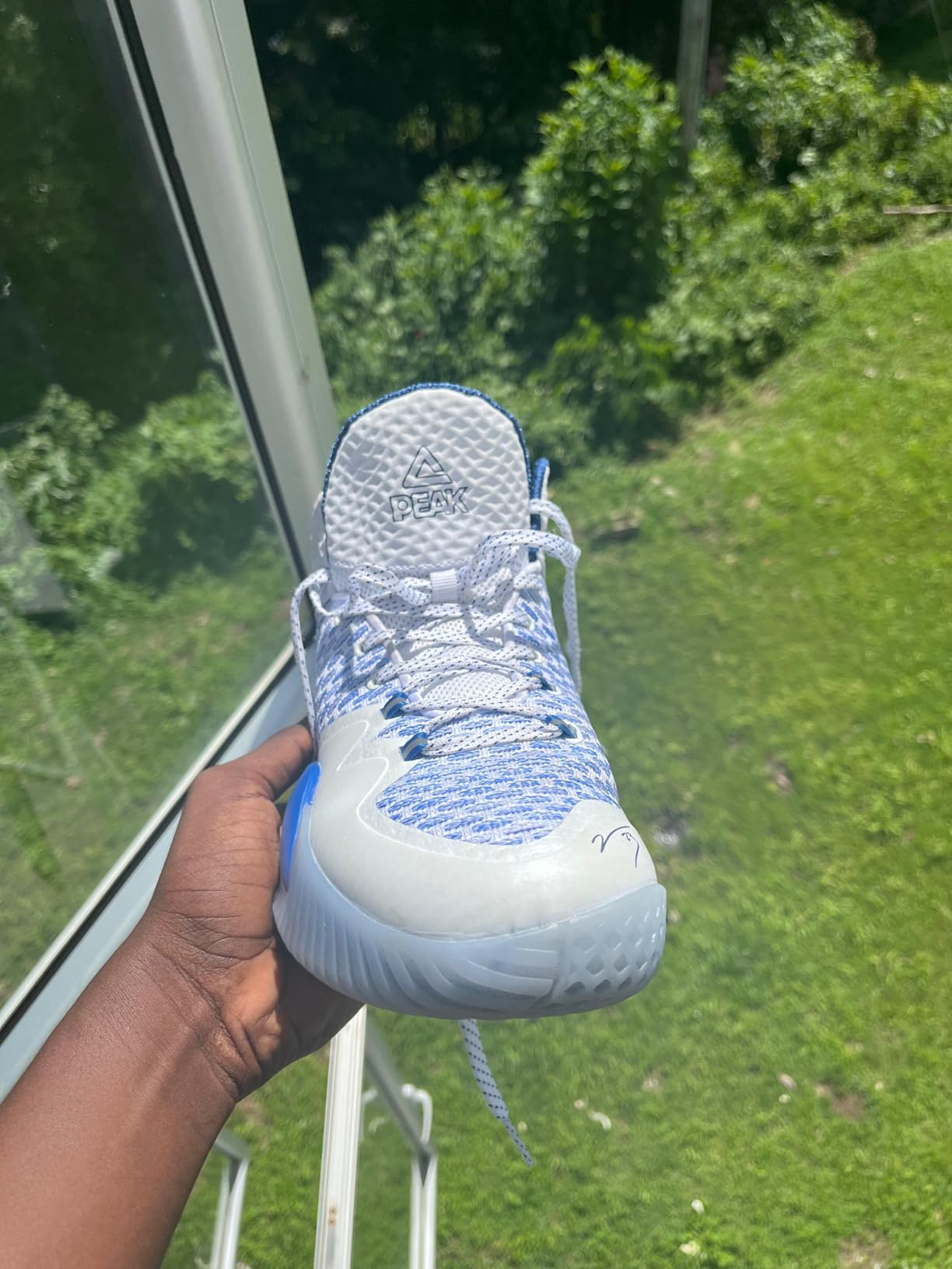 PEAK Streetball Master outsole showing parametric traction pattern and rubber compound