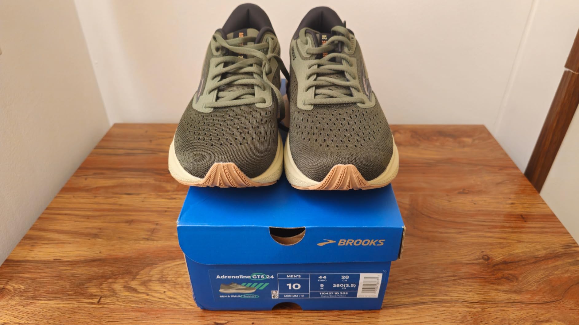 Close-up detail of Brooks Adrenaline GTS 24 showing engineered mesh upper and GuideRails technology integration