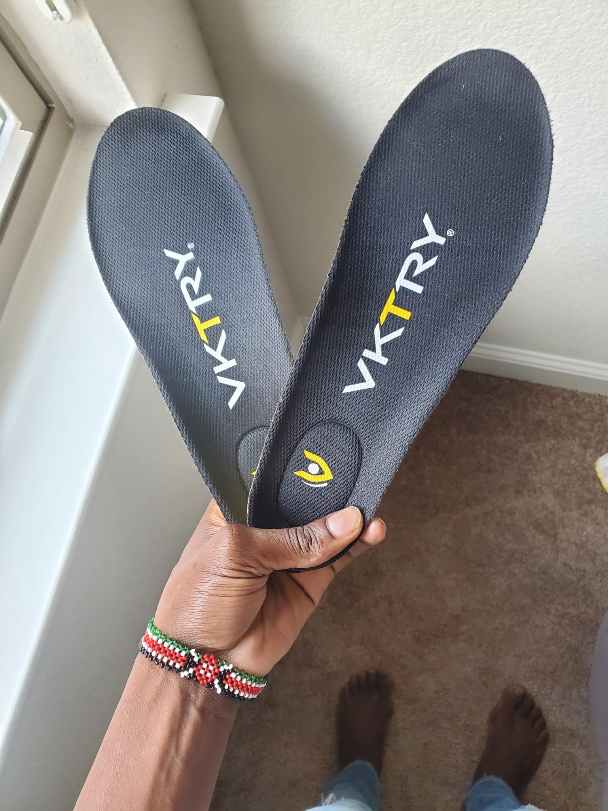 User testimonial photo showing positive experience with VKTRY insoles for basketball performance