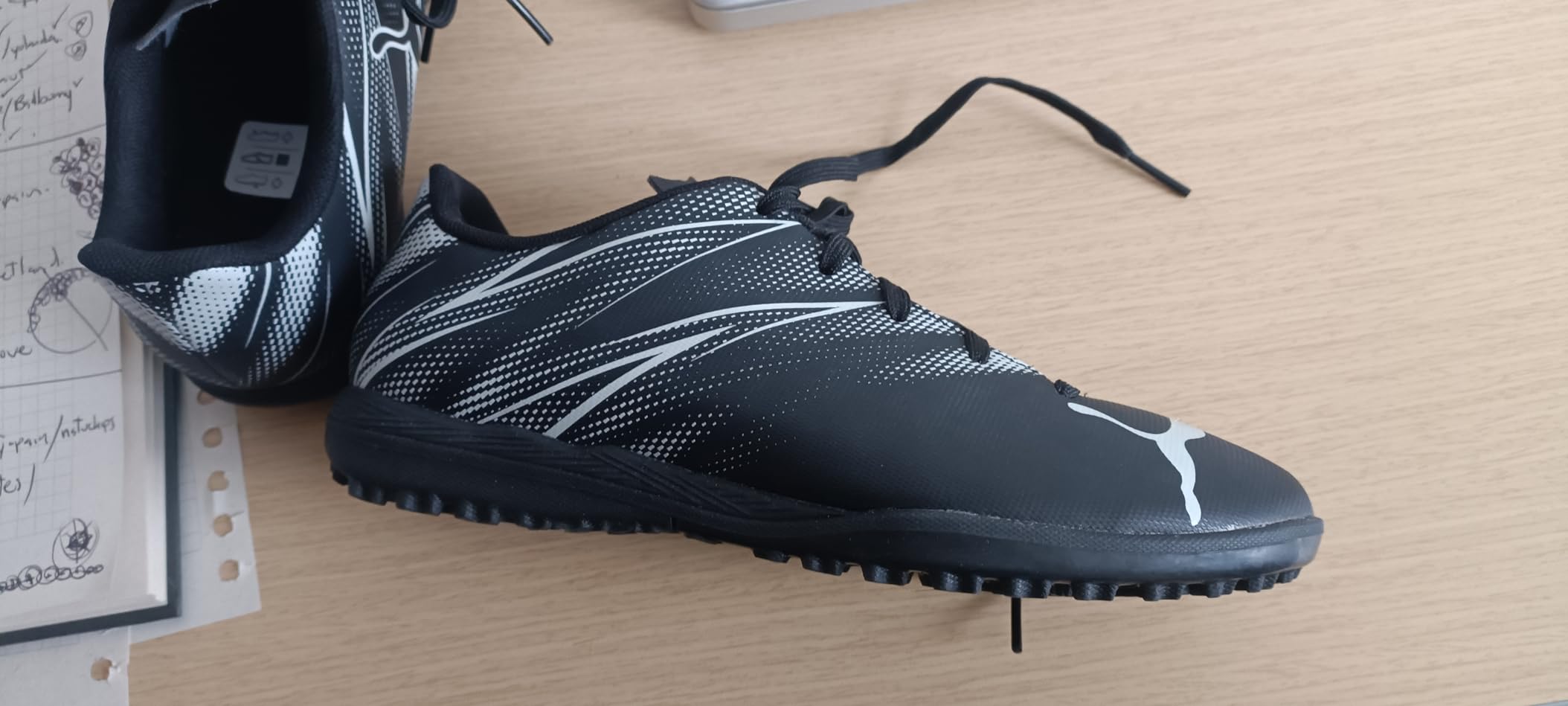 Full pair of PUMA Attacanto soccer cleats showing complete design and construction